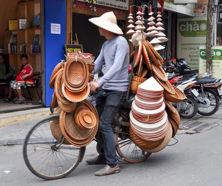 Selling non la hats in Hanoi