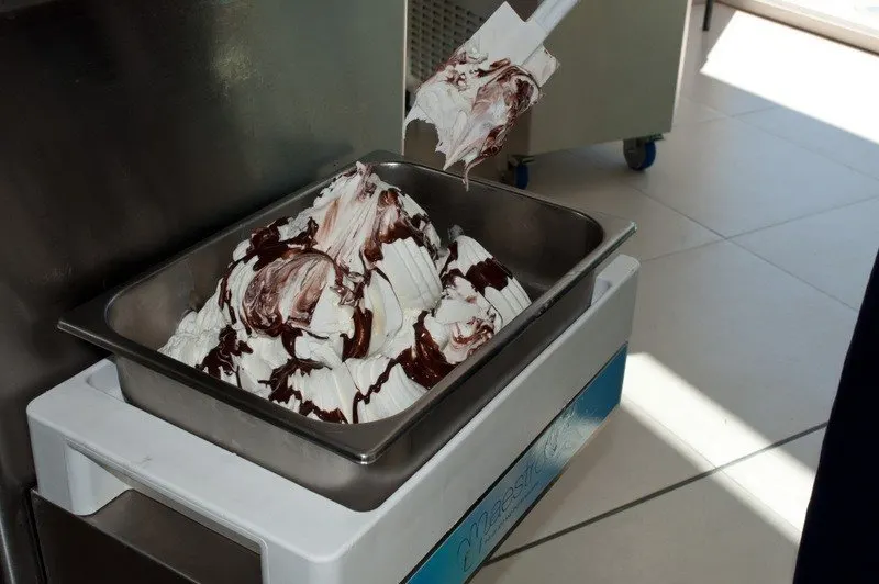 Gelato pouring into a tray at the Gelato university, Bologna