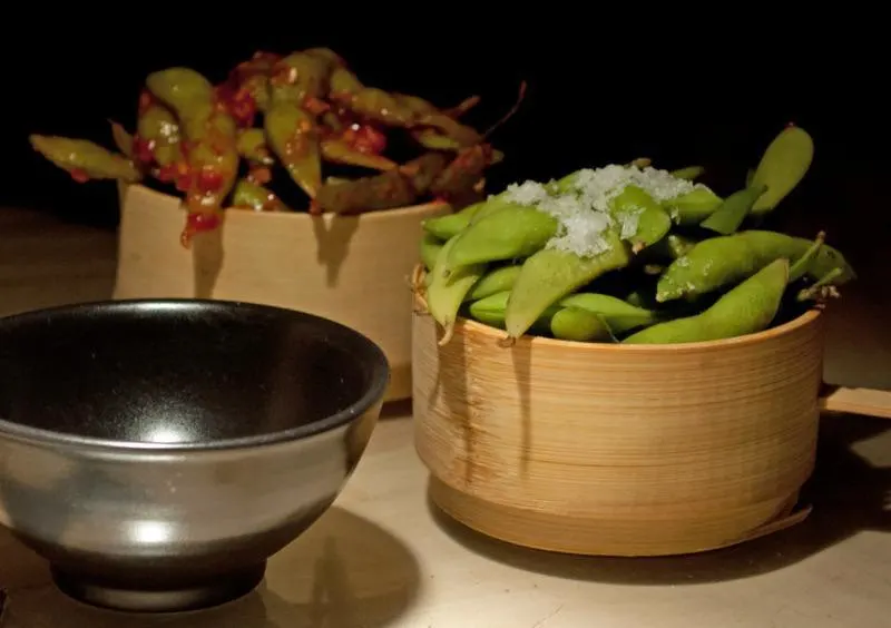 warm edamame beans in rock salt and chilli sauce