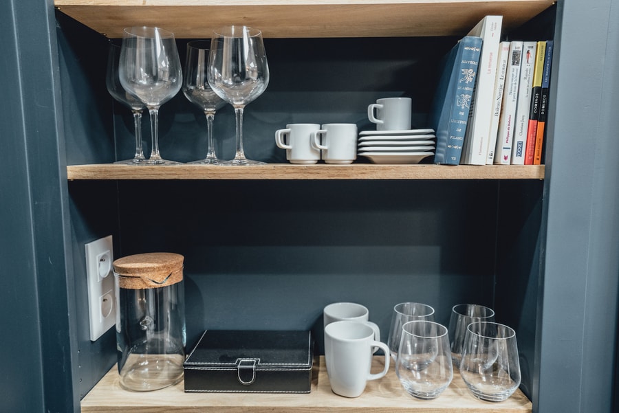 crockery and glasses on shelf