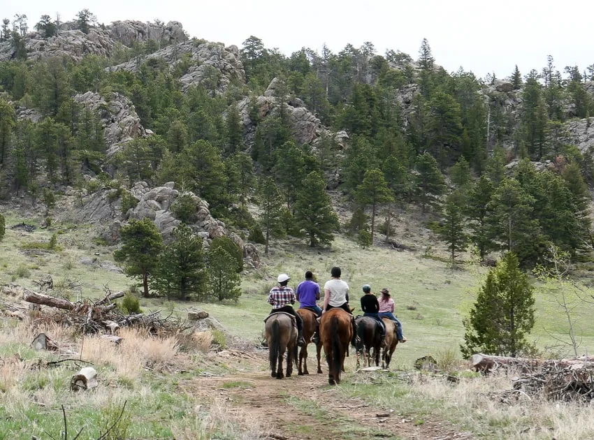 A group of horse back riders out in Arapaho National Park
