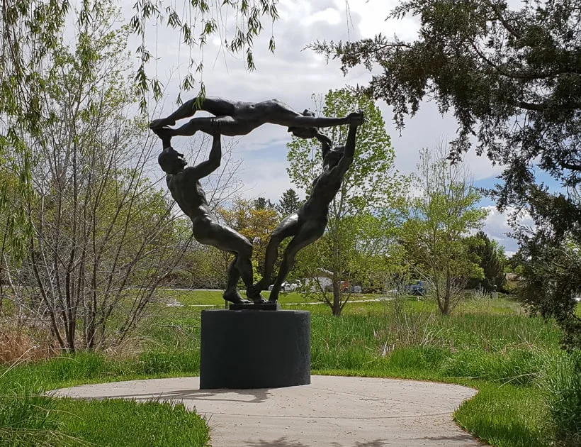 Sculpture man and two women