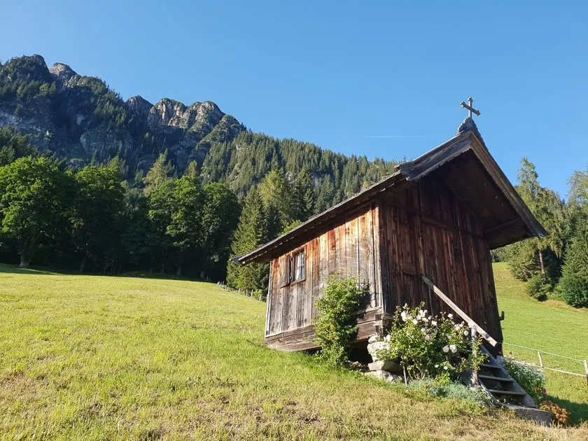 Tiny wooden chapel on Austrian hillside