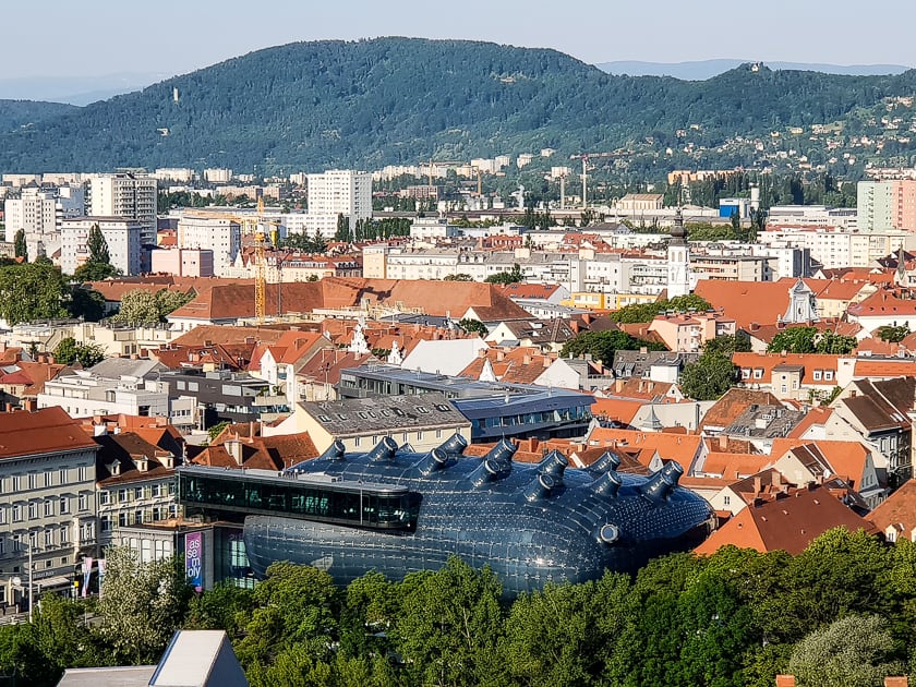 Kunsthaus Graz and view of the city of Graz, Austria 
from the Clock Tower