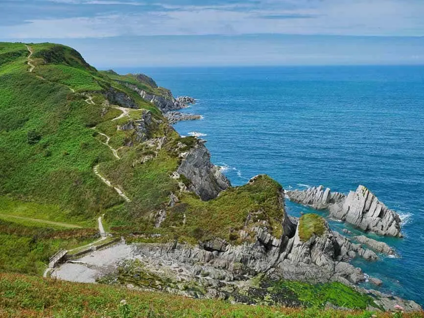 North Devon coast near Lee Bay grass topped cliffs and blue seas