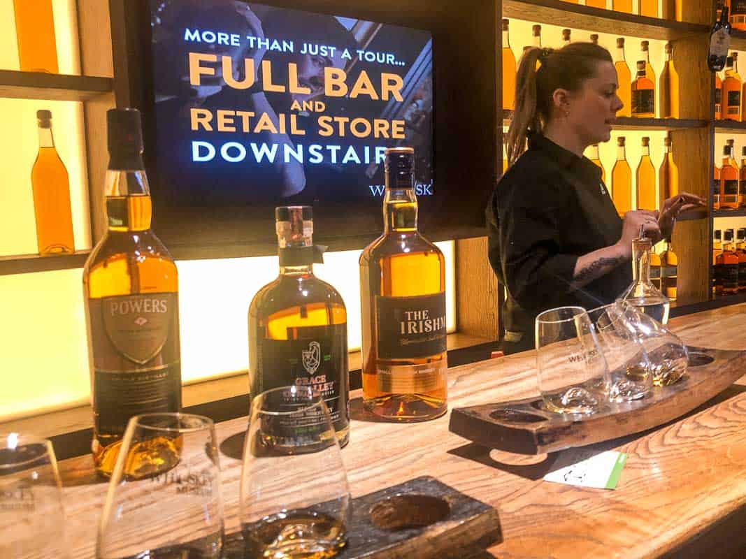 Bottles and glasses of whiskey at the Irish Whiskey Museum in Dublin