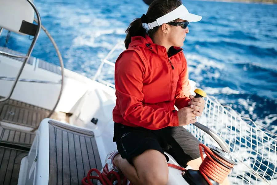 Sailing outfit - woman in jacket and visor