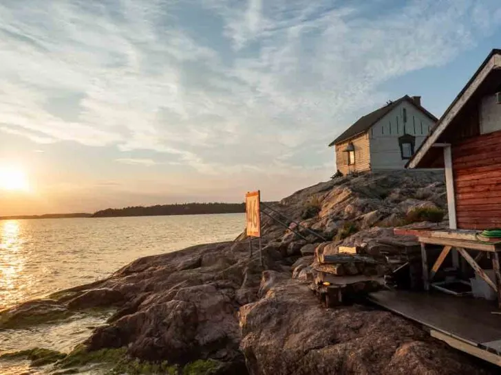 Turku Archipelago - wooden huts on small island at sunset
