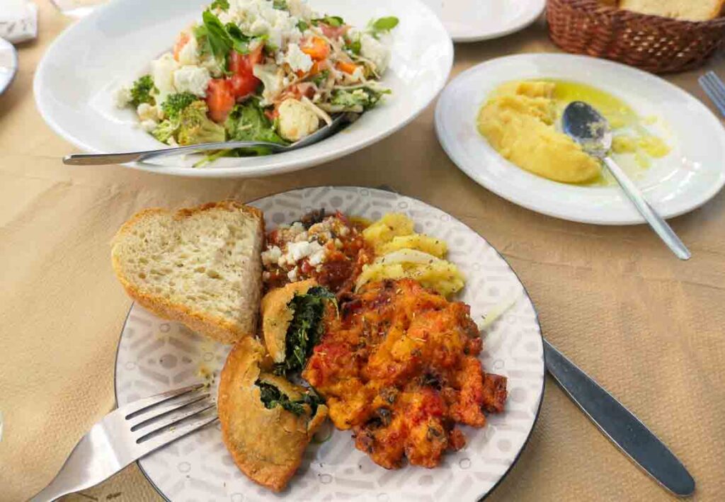 Farm salad, fava dip, spanakopita and tomato fritters - Cretan lunch