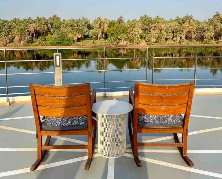 View of the Nile from sun deck chairs on deck of Viking Osiris