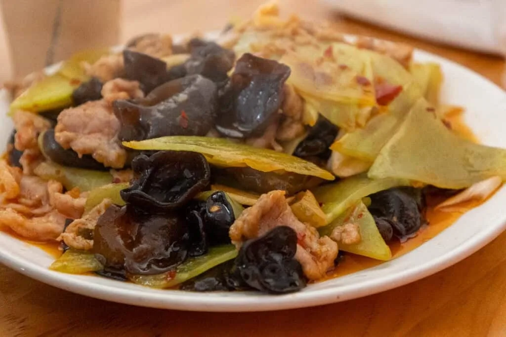 mushroom dish with vegetables and chicken in China